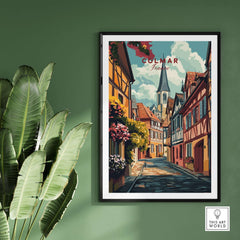 Colmar Wall Art featuring a picturesque street scene from Colmar, France, surrounded by lush green plants.