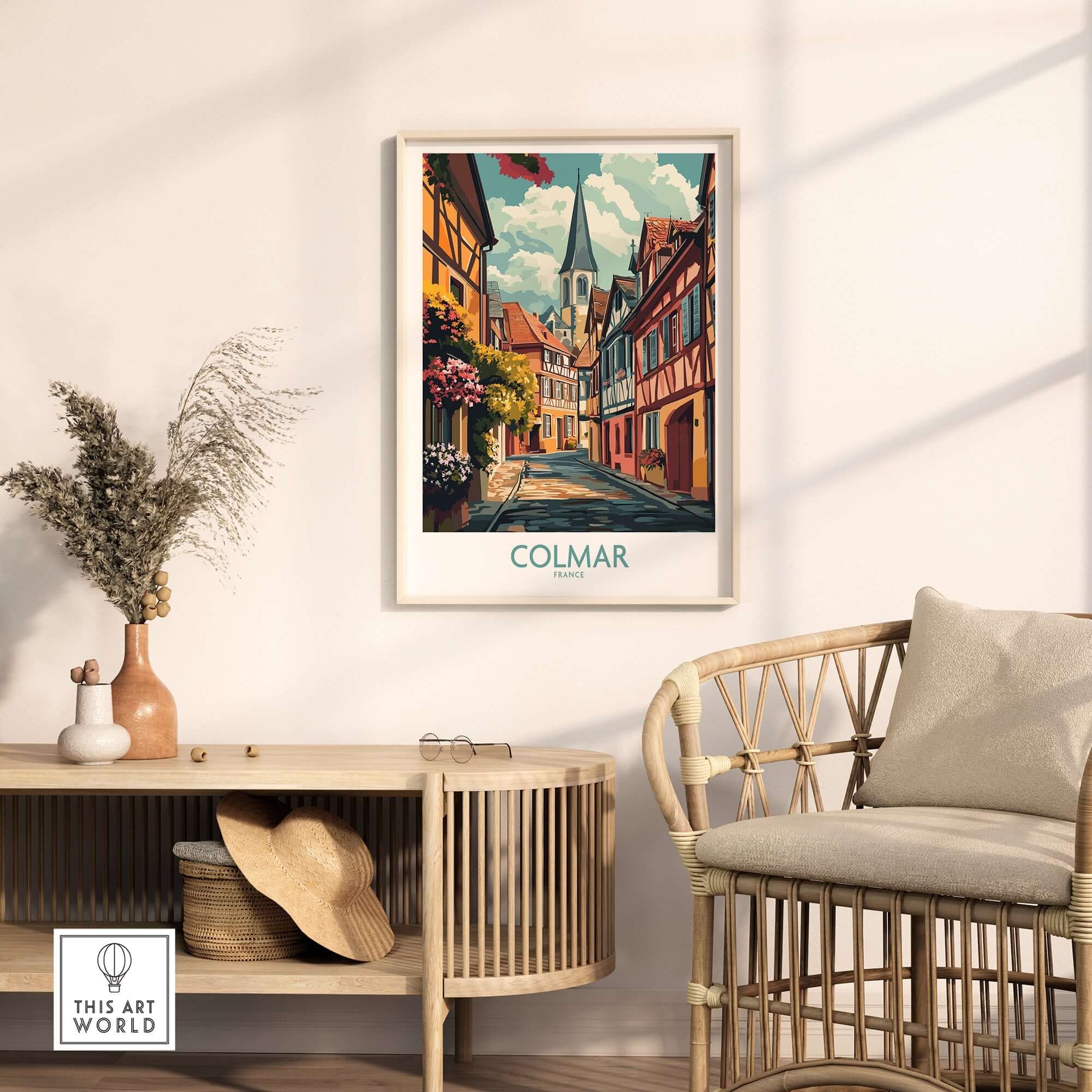 Colmar Wall Art Print displayed on a wall above a stylish chair in a modern living space, showcasing vibrant colors and charming details.