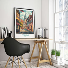 Colmar Wall Art Print displayed in a stylish room with a black chair and wooden desk, showcasing charming architecture.