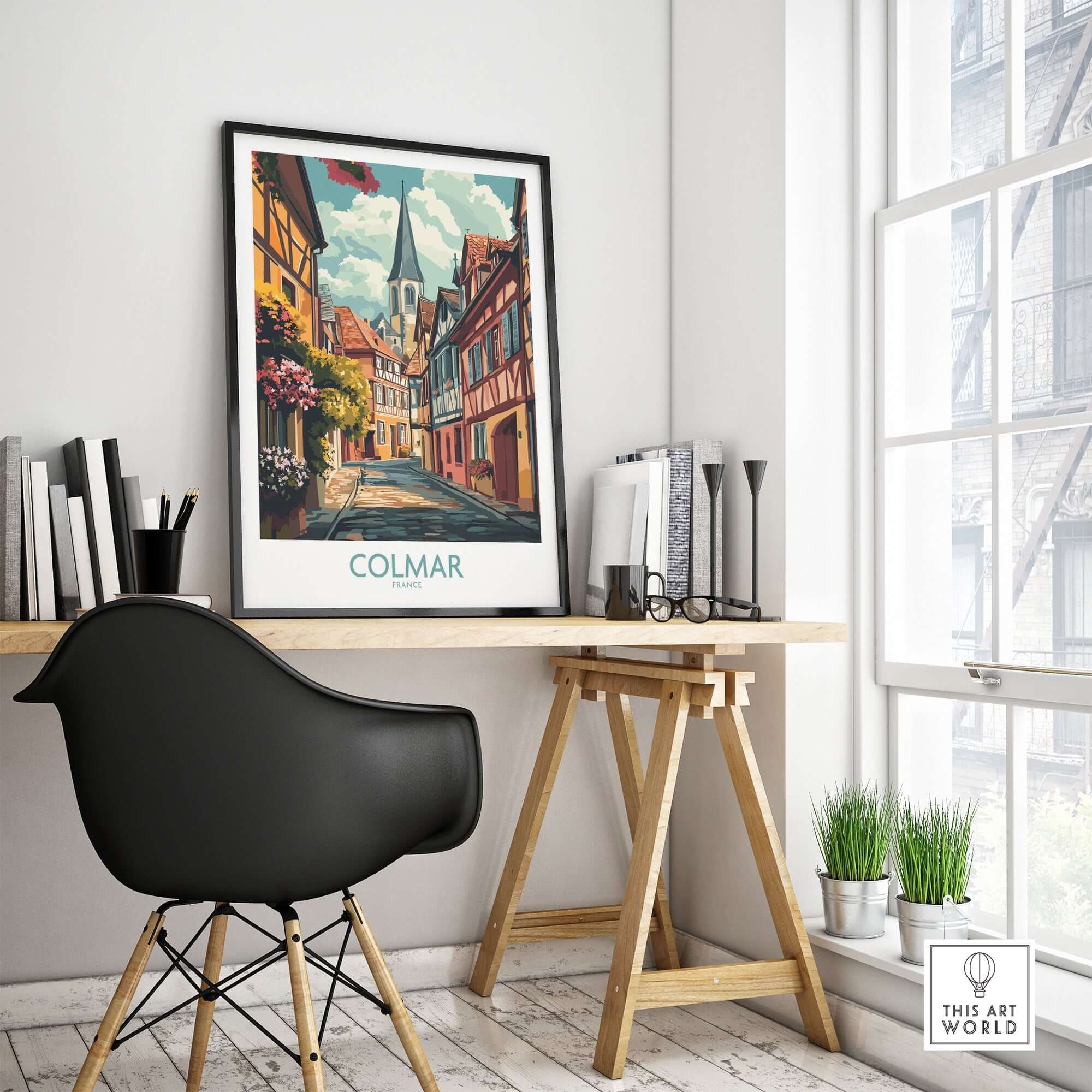 Colmar Wall Art Print displayed in a stylish room with a black chair and wooden desk, showcasing charming architecture.