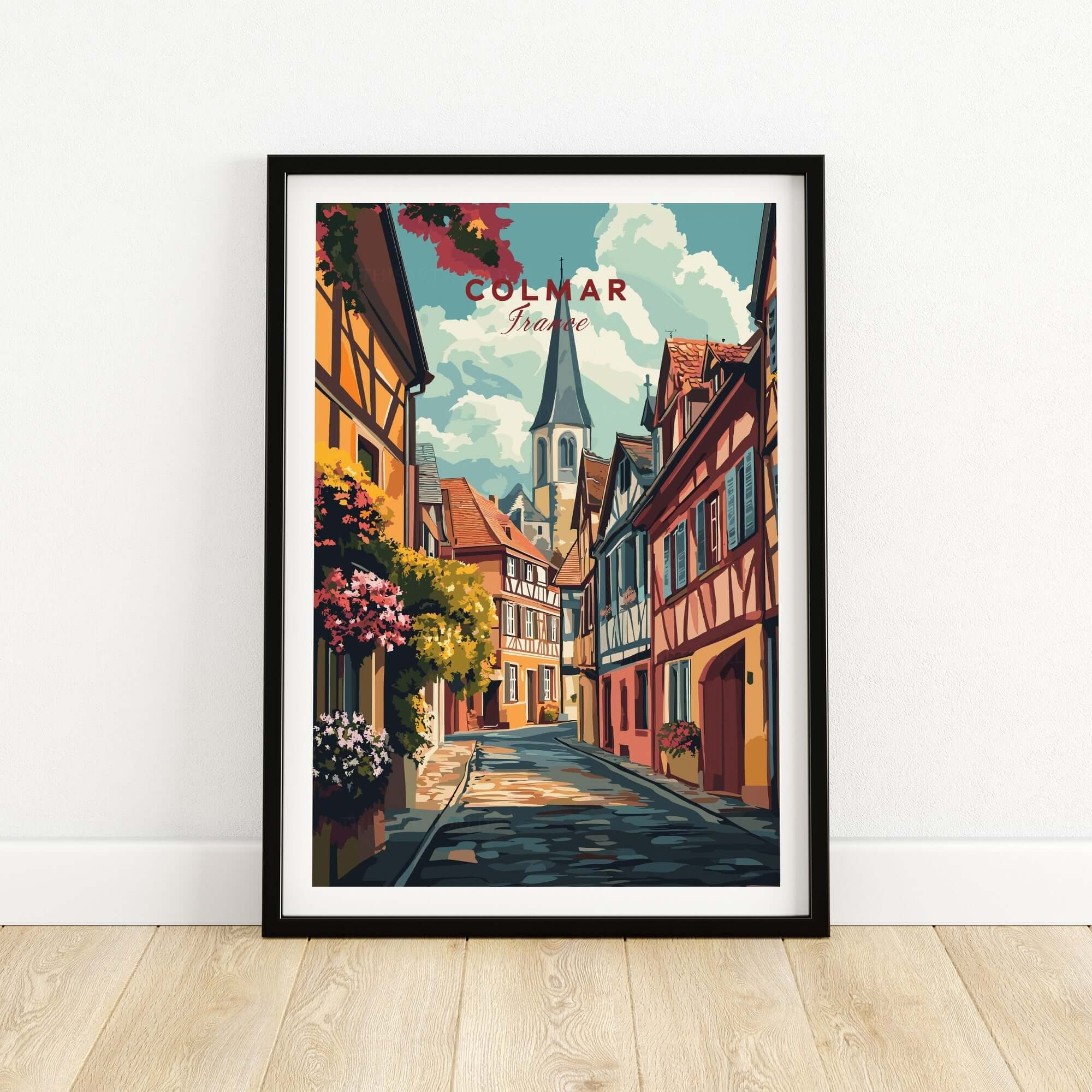 Colmar Wall Art depicting a charming street in Colmar, France with colorful buildings and flowers.