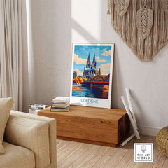 Cologne Poster Germany showcasing the stunning Cologne Cathedral and vibrant scenery in a stylish interior setting.