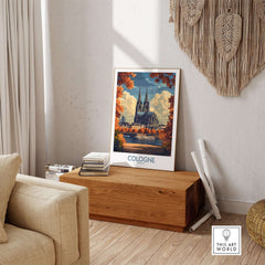 Cologne Travel Poster showcasing the vibrant architecture and autumn colors of Cologne in a stylish interior setting.
