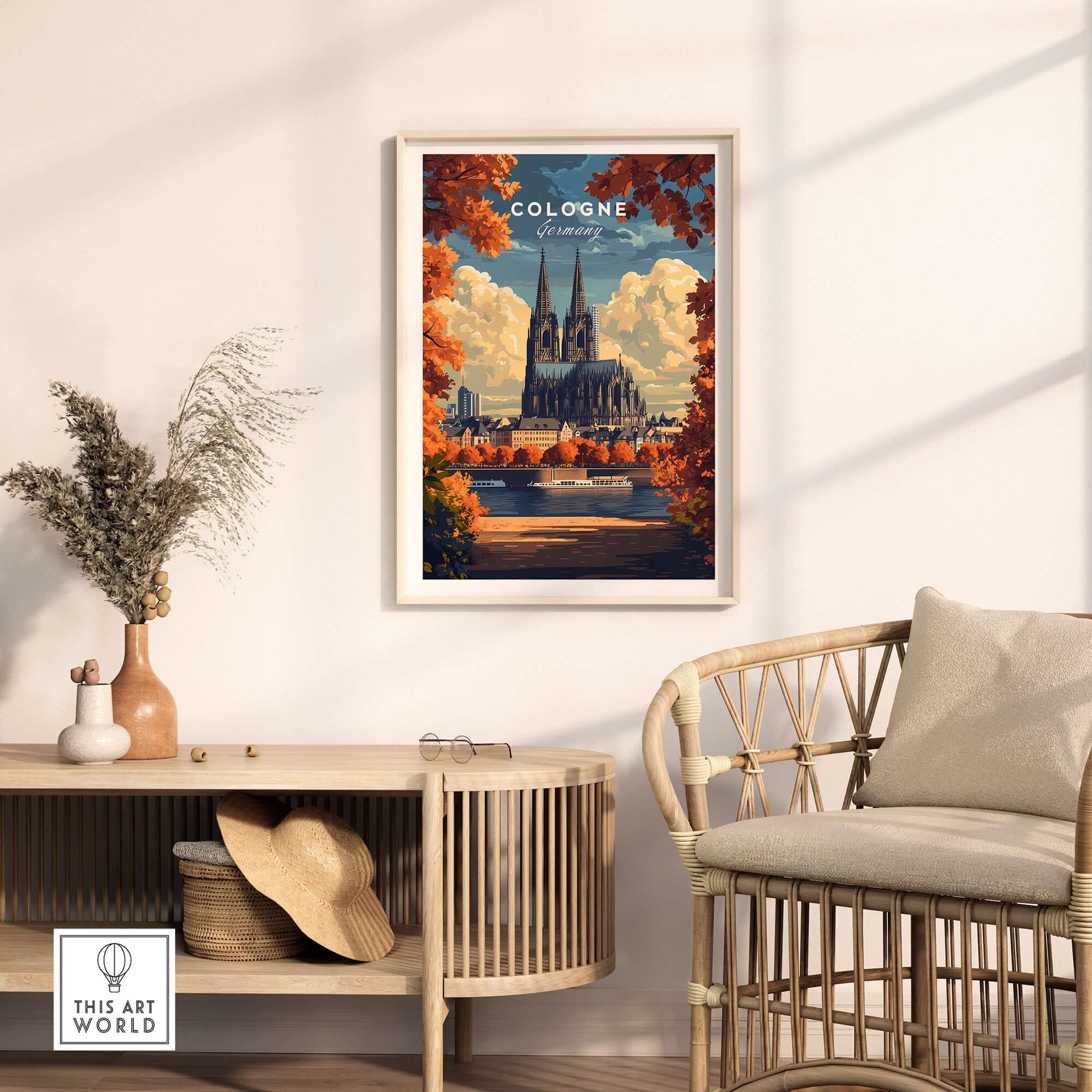 Cologne Travel Print featuring the iconic Cologne Cathedral, vibrant colors, and autumn leaves in a stylish interior.