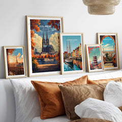 Cologne Travel Print displayed among other city prints in a cozy home setting.