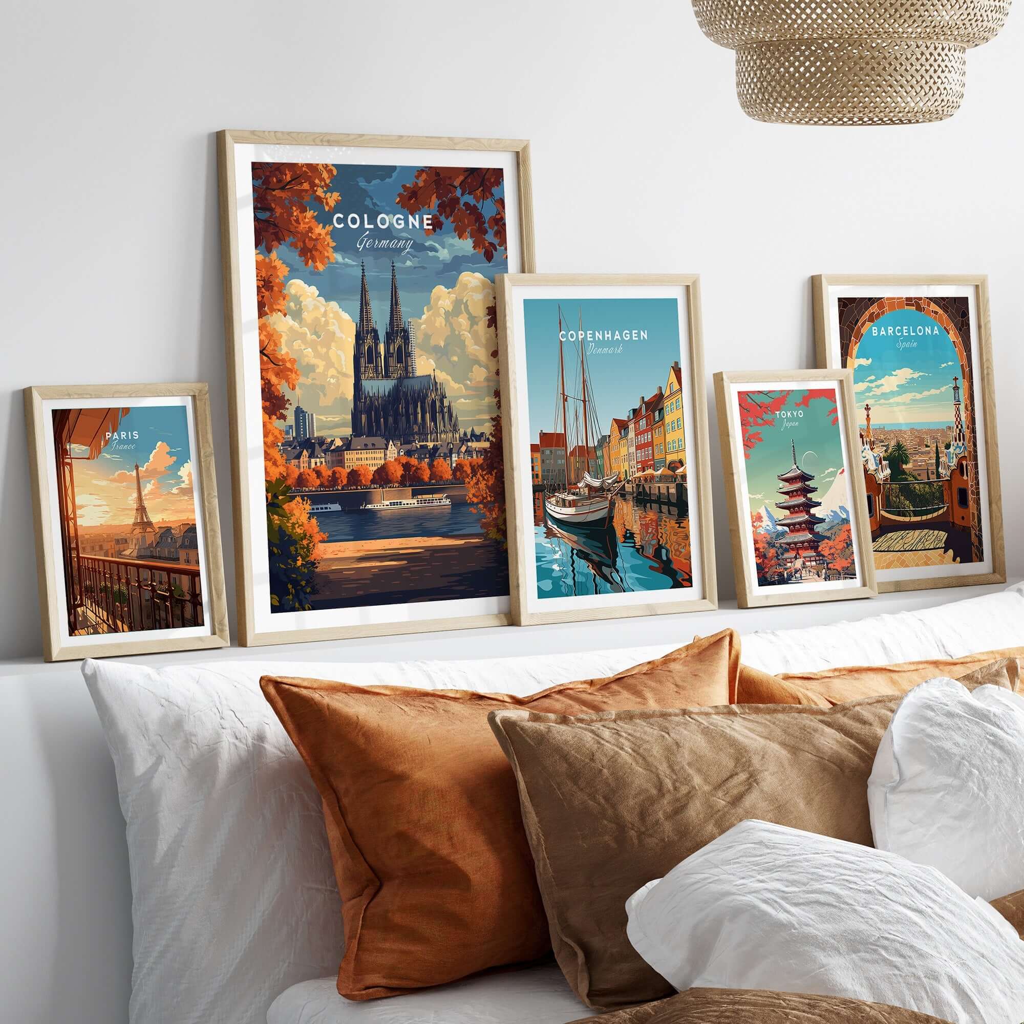 Cologne Travel Print displayed among other city prints in a cozy home setting.