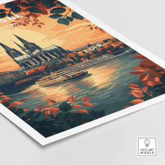 Cologne Wall Art featuring a vibrant sunset and cityscape over a river with warm hues and lush foliage.