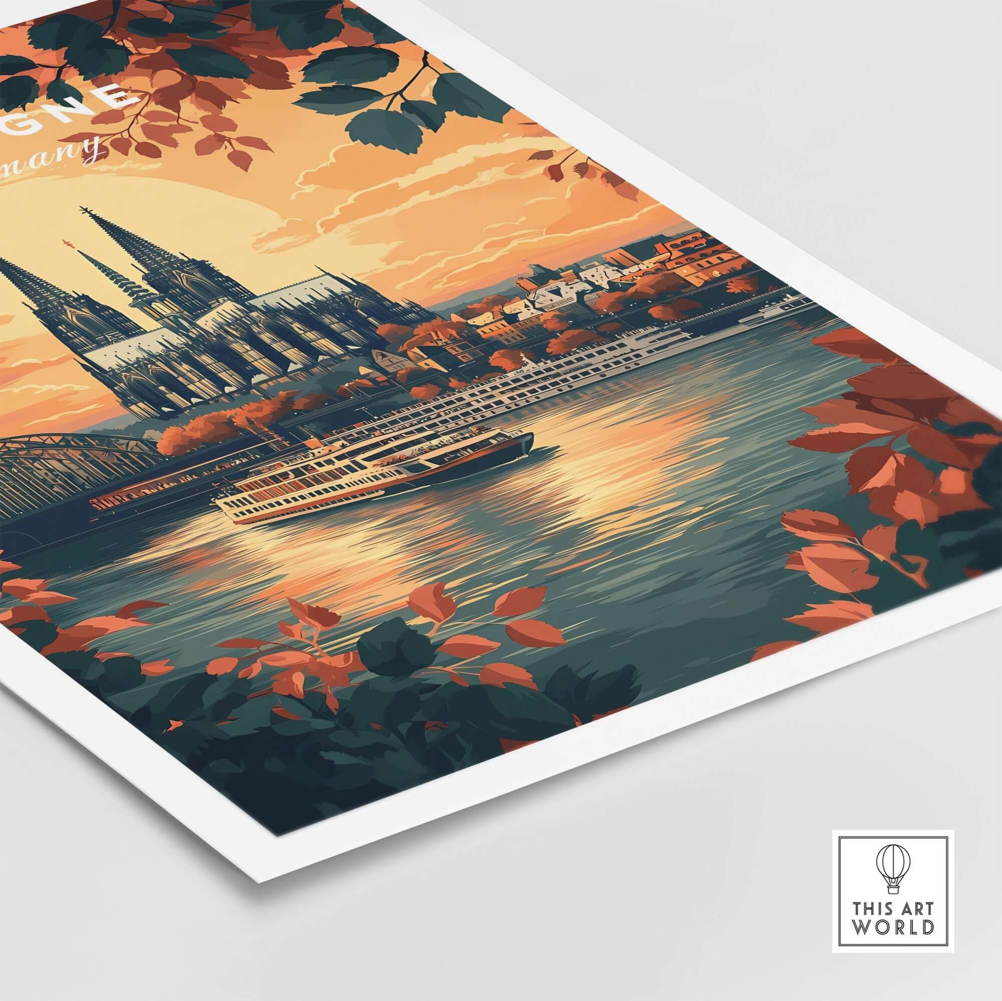 Cologne Wall Art featuring a vibrant sunset and cityscape over a river with warm hues and lush foliage.