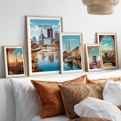 Columbus Ohio Travel Poster – City Skyline featured among various travel posters on a stylish bed display.