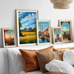 Connecticut Art Print displayed among travel posters in a modern living room setting with decorative pillows.
