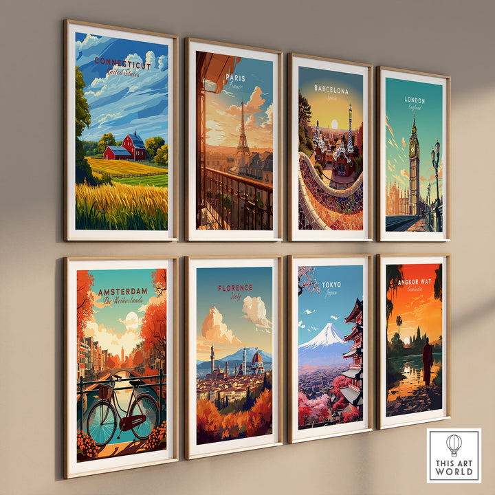 Wall display of art prints featuring cities including Connecticut, Paris, Barcelona, London, Amsterdam, Florence, Tokyo, and Angkor Wat.