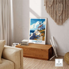 Connecticut Travel Poster showcasing a picturesque lighthouse and coastal landscape in a stylish home setting.