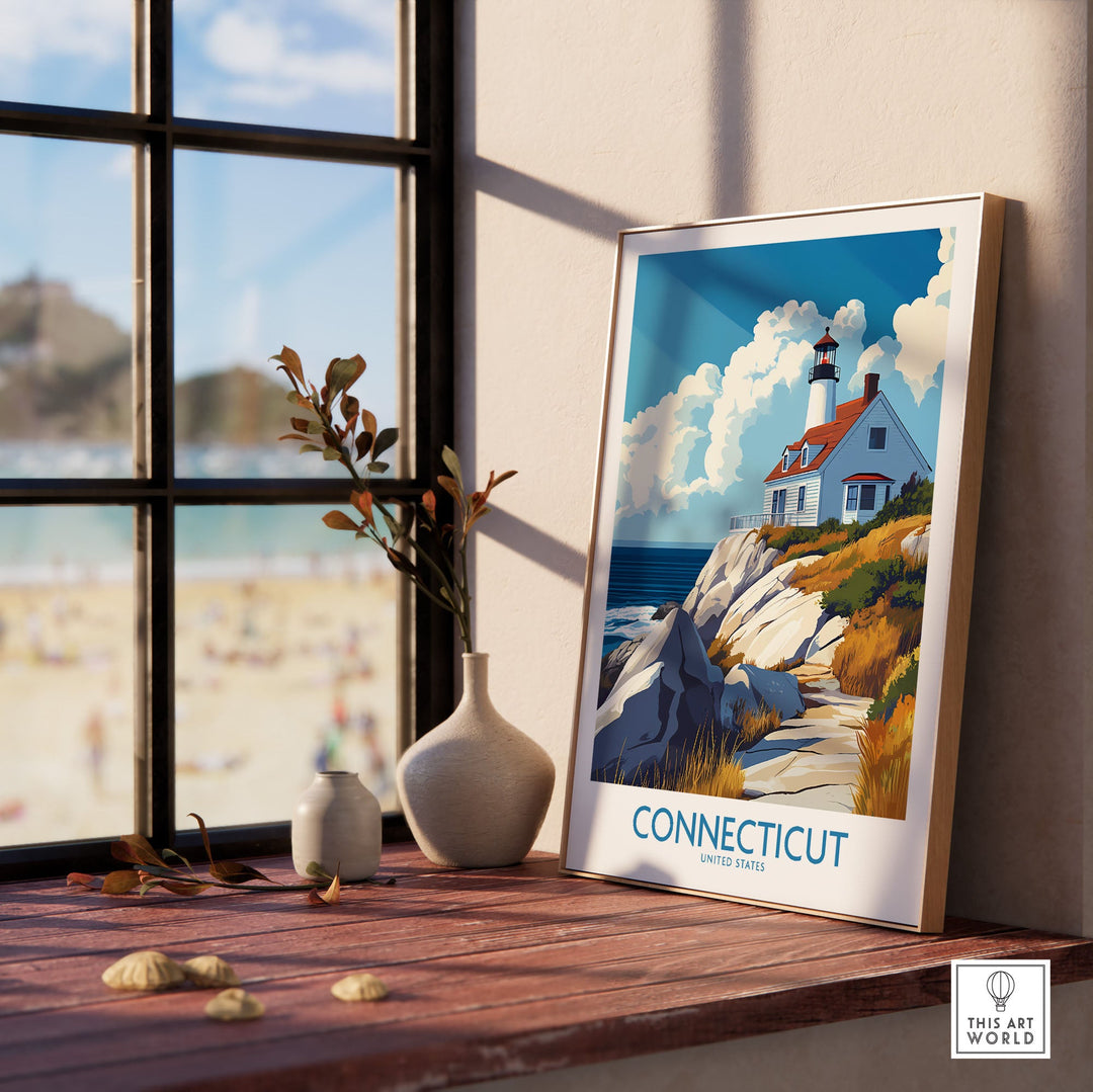 Connecticut travel poster featuring a lighthouse by the sea, displayed on a sunny windowsill with beach view.