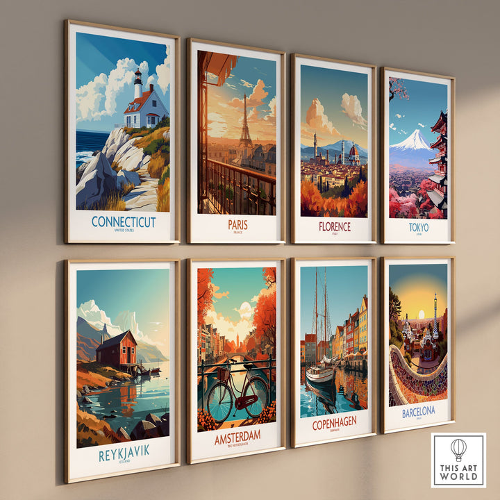 Gallery wall featuring travel posters from Connecticut, Paris, Florence, Tokyo, Reykjavik, Amsterdam, Copenhagen, and Barcelona.