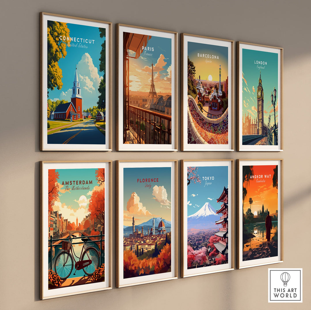 Gallery wall with travel posters featuring Connecticut, Paris, Barcelona, London, Amsterdam, Florence, Tokyo, and Bangkok Wat.