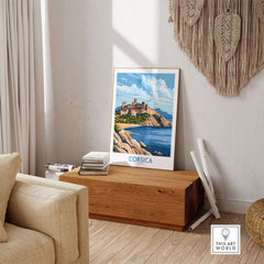 Corsica Travel Poster showcasing the beautiful landscape and architecture of Corsica in a stylish home setting.