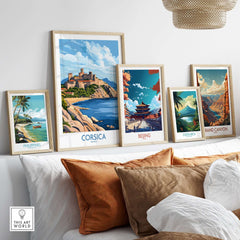 Corsica Travel Poster displayed among other travel posters in a stylish home decor setting.