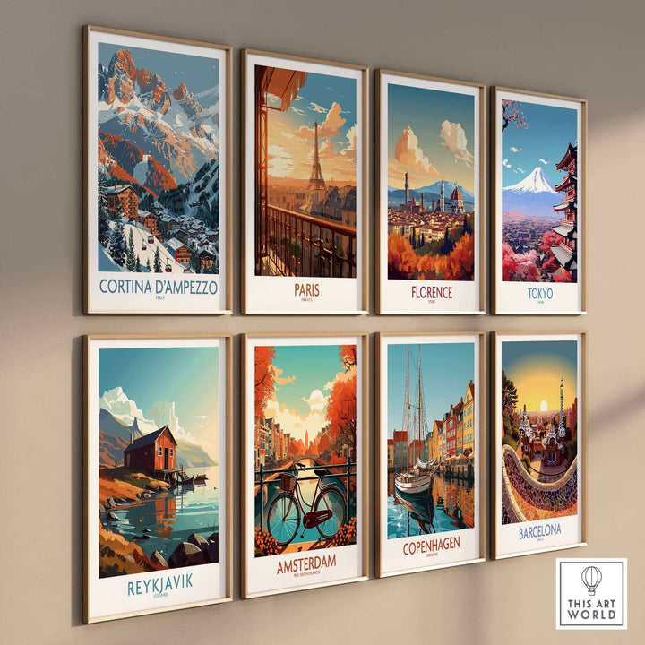 Travel-themed art prints of Cortina d'Ampezzo, Paris, Florence, Tokyo, Reykjavik, Amsterdam, Copenhagen, and Barcelona on a wall.