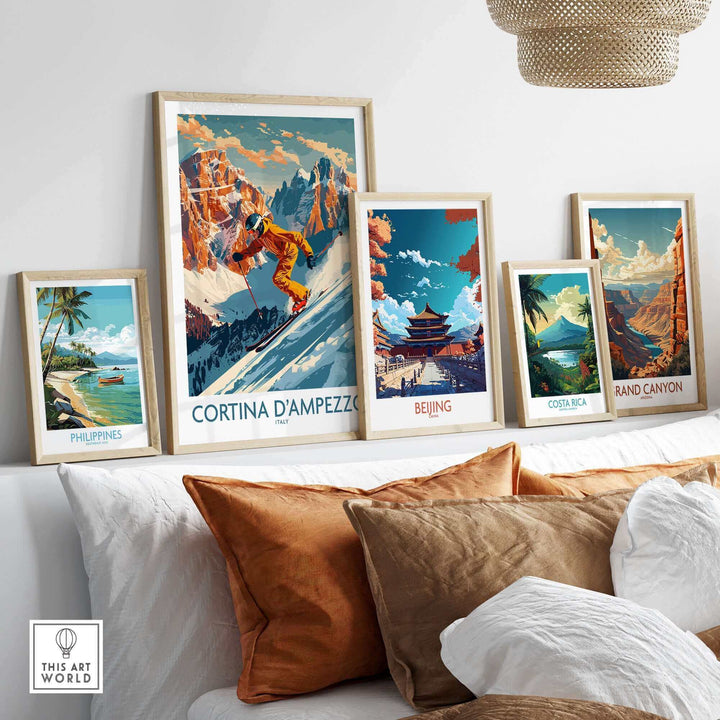 Gallery wall with Cortina d'Ampezzo and international travel-themed art prints in a cozy living room setting.