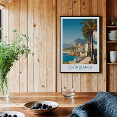 Costa Blanca Wall Art - Canvas Poster Spain displayed in a warm interior setting with wooden walls and decor.