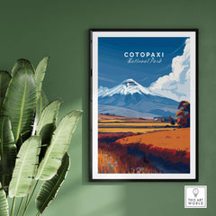 Cotopaxi National Park Ecuador Travel Print Volcano Landscape Poster Wall Art Decor framed on green wall with plants.