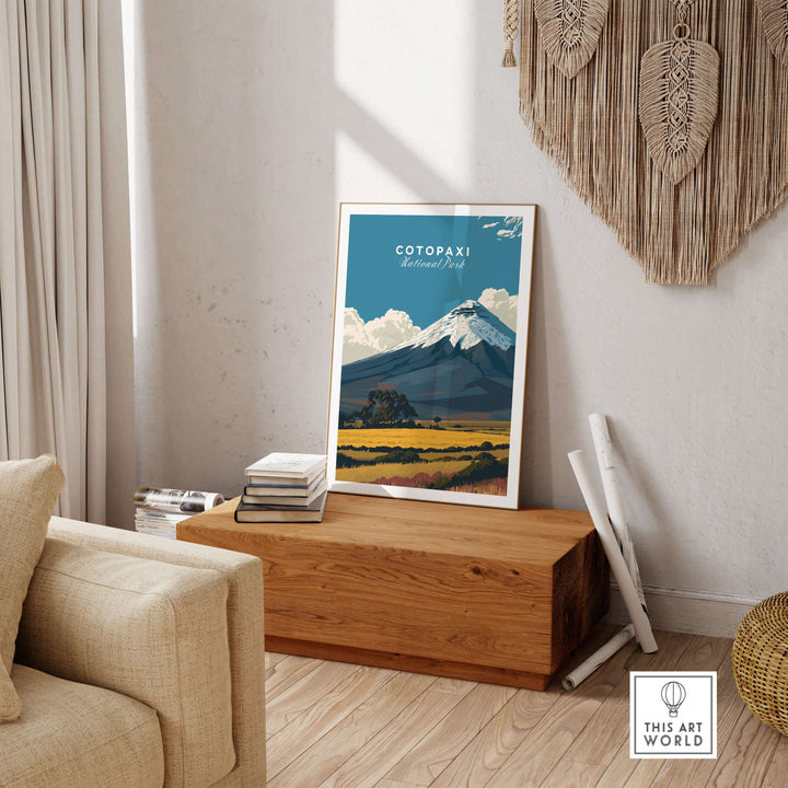 Cotopaxi National Park travel poster featuring snow-capped volcano and golden fields in a cozy interior setting.