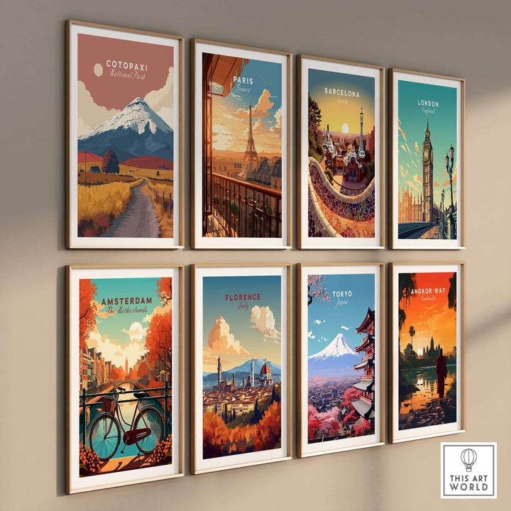 Gallery wall featuring travel posters of Cotopaxi, Paris, Barcelona, London, Amsterdam, Florence, Tokyo, and Angkor Wat.