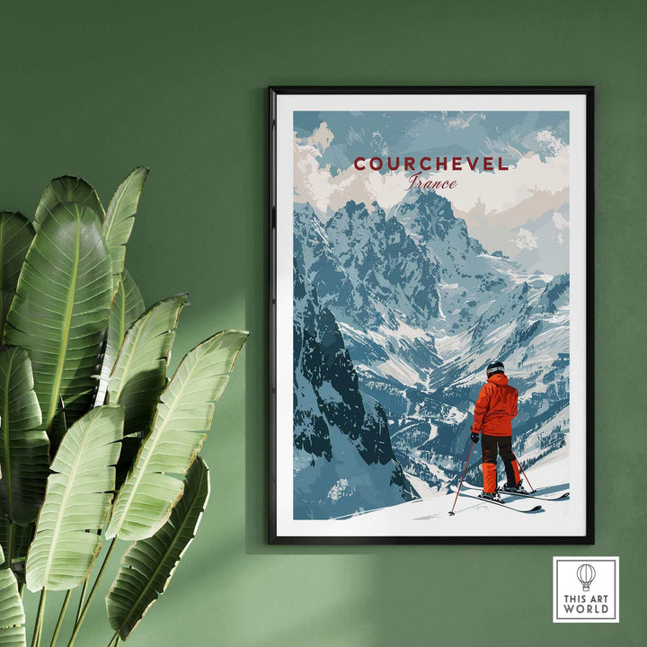 Courchevel Ski Poster featuring a skier overlooking snowy mountains, displayed on a green wall with tropical plants.