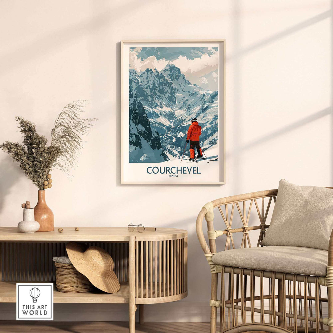 Courchevel wall art featuring a skier in a red outfit on a snowy mountain, displayed in a cozy room with natural decor.