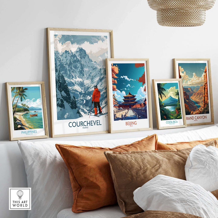 Modern living room with framed Courchevel wall art alongside travel posters of Beijing, Philippines, Costa Rica, and Grand Canyon.