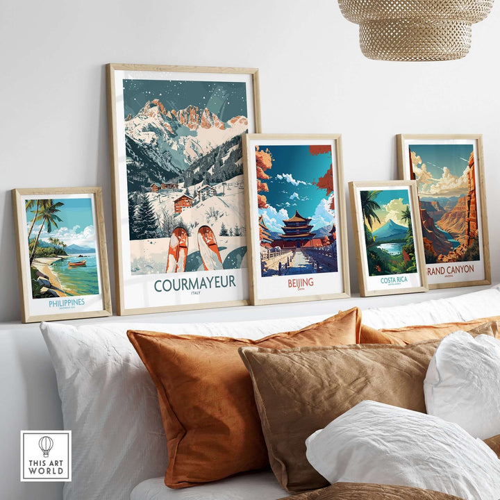 Collection of framed travel posters featuring Courmayeur ski poster among others, displayed on a shelf in a cozy room.