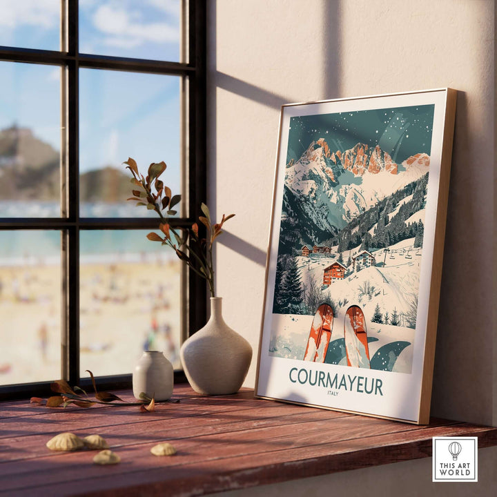 Courmayeur ski poster with Italian alpine scenery, framed and displayed on a sunny windowsill with decorative vases.