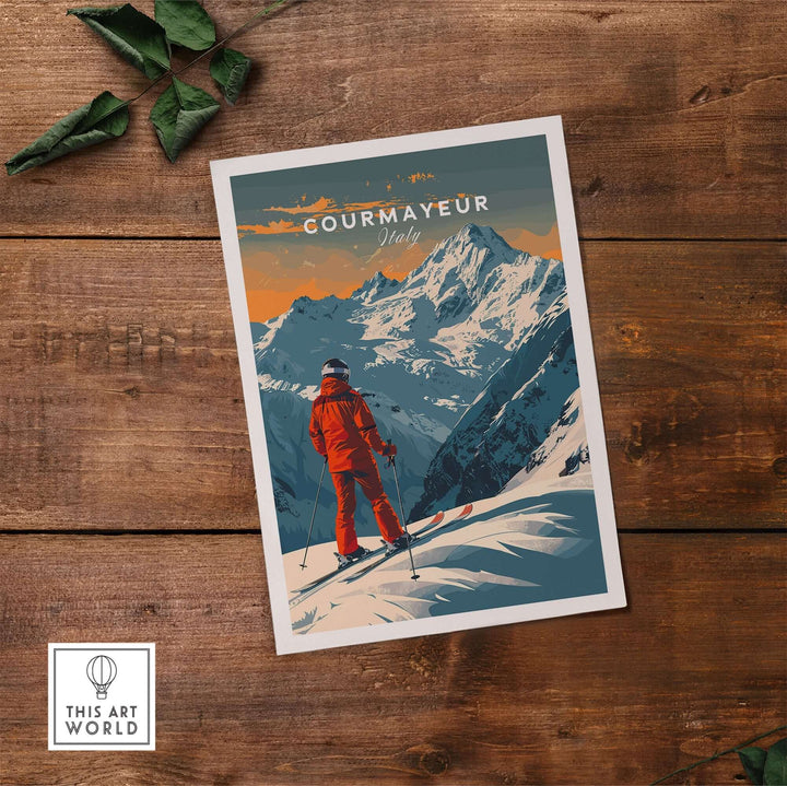 Courmayeur ski poster featuring a skier with mountains in Italy, displayed on a wooden table with green leaves.