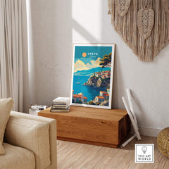 Crete Wall Art showcasing a picturesque coastal scene in a stylish home setting with a wooden bench.