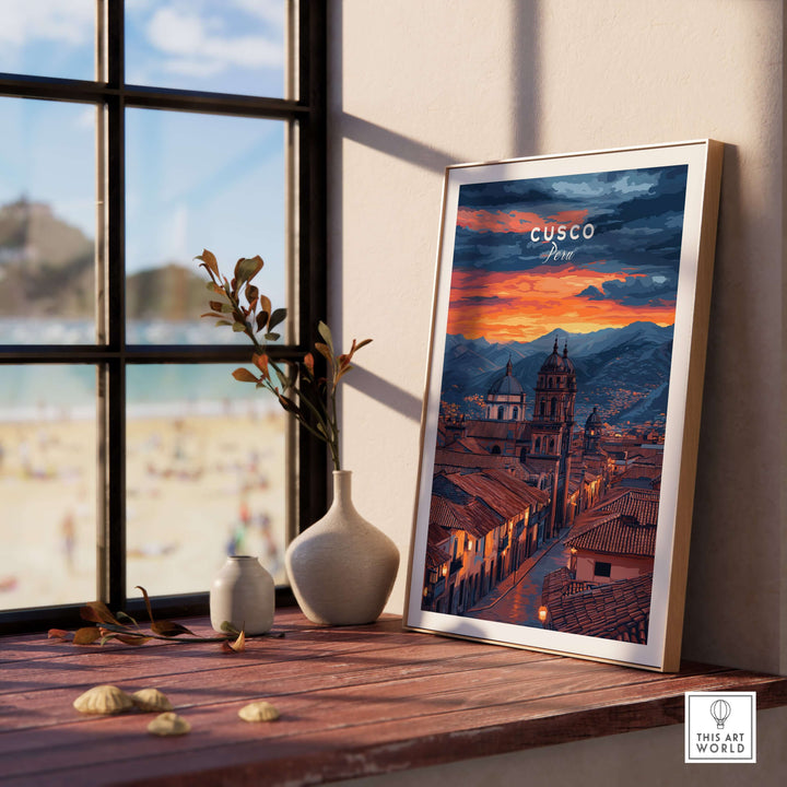 Cusco Evening Street View Print | Glowing Andes Home Decor displayed on wooden table near a window.