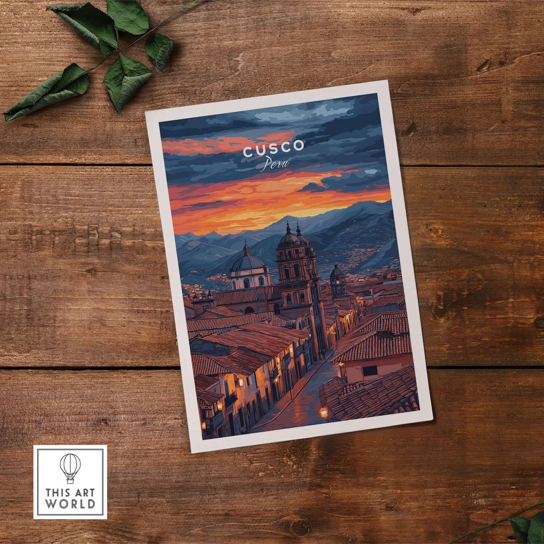 Cusco Evening Street View Print | Glowing Andes Home Decor displayed on wooden surface, featuring Andes scenery at dusk.