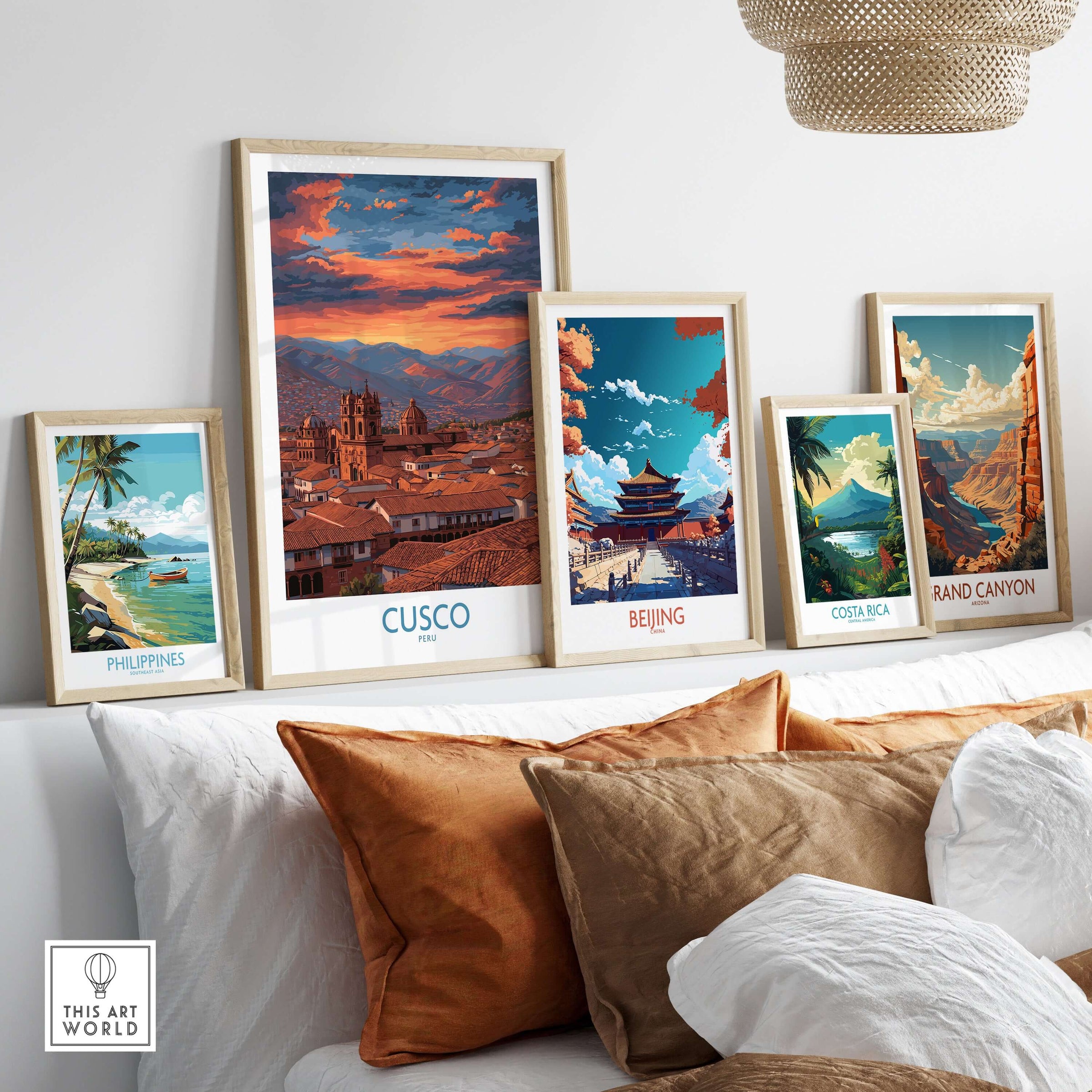 Cusco Peru Orange Sunset Art Print | Mountain City Skyline Poster displayed among other art prints on a cozy couch.