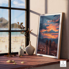 CUSCO Peru Print | Peruvian Travel Wall Decor showcasing vibrant sunset over Cusco in a framed print on a wooden table.