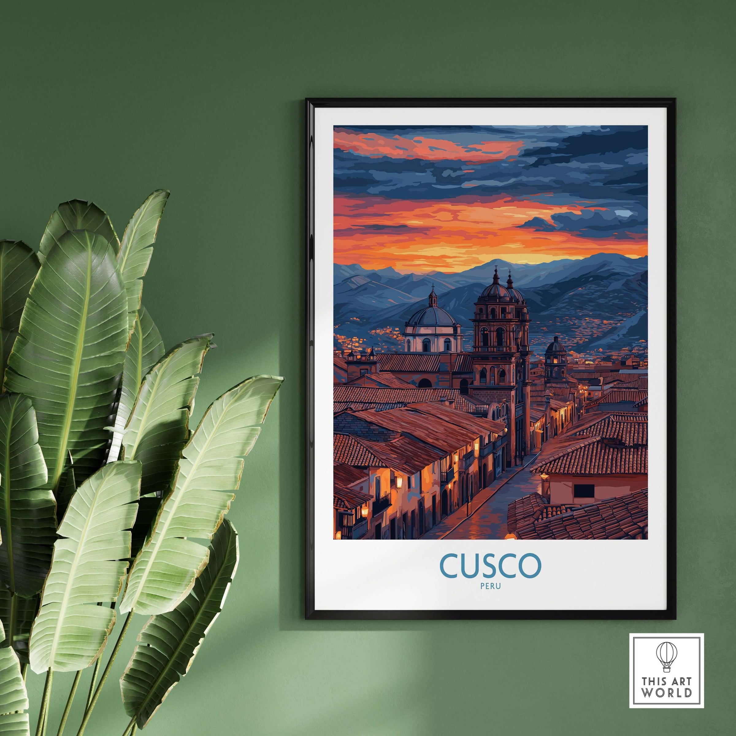 Cusco Peru Twilight Cityscape Art Print | Historic Rooftops Poster framed on a green wall with plants and sunset view.