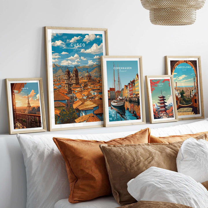 Cusco Print | Andean Mountain Home Decor showcasing framed Cusco and travel prints on a stylish bed.
