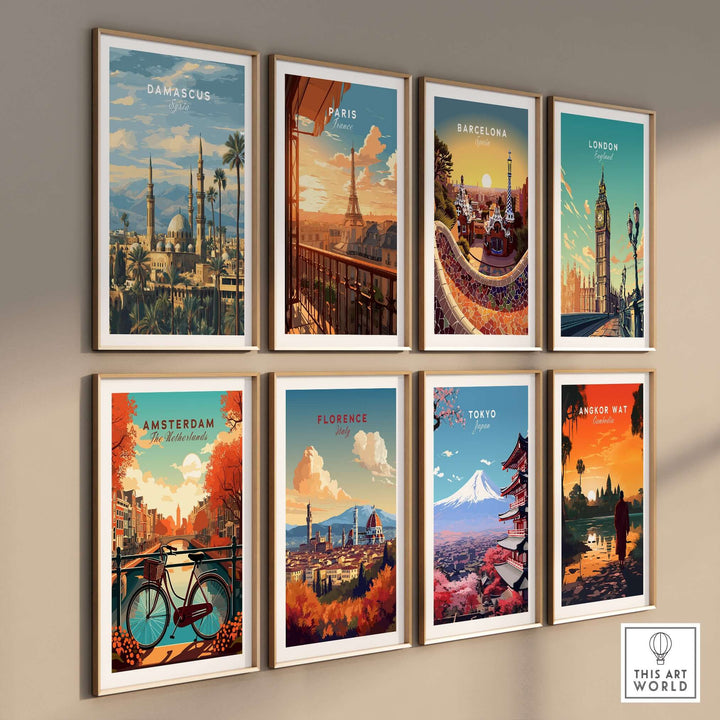 Gallery wall featuring travel prints of major cities: Damascus, Paris, Barcelona, London, Amsterdam, Florence, Tokyo, and Angkor Wat.