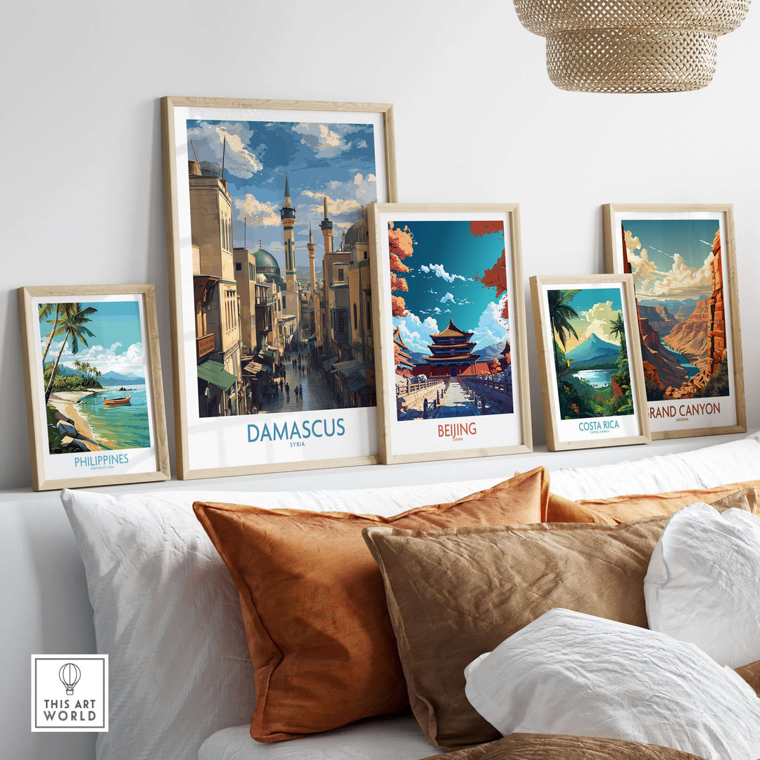 Framed travel posters of Damascus, Beijing, Costa Rica, the Philippines, and Grand Canyon displayed on a cozy shelf.