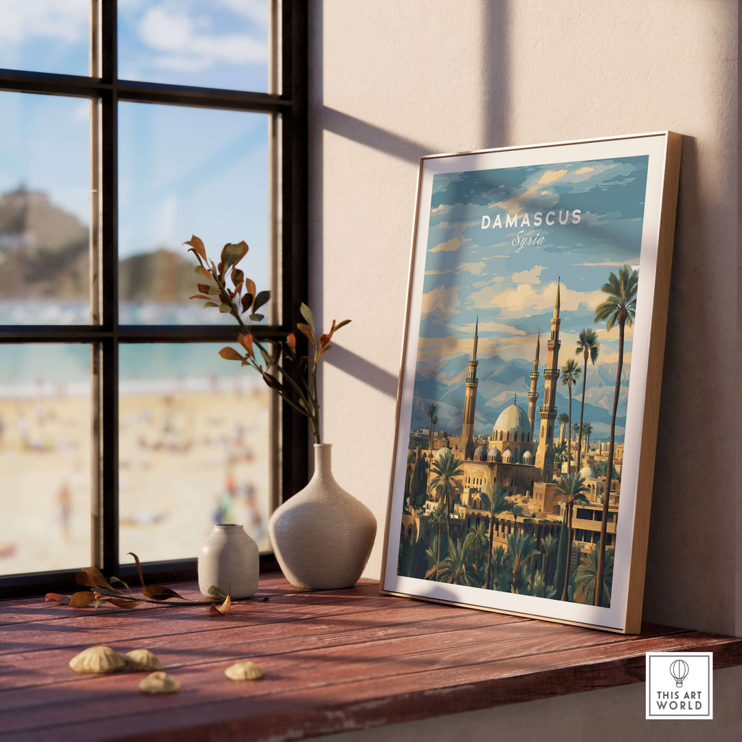 Damascus travel print featuring a mosque and palm trees, displayed in a sunlit room with a beach view.