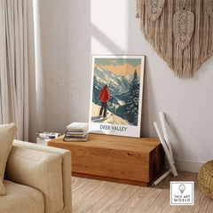 Deer Valley Poster Utah displayed in a cozy room, featuring a skier surrounded by stunning mountain scenery.