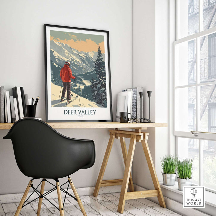 Deer Valley ski poster on desk in modern room, featuring snowy Utah mountain scene with skier in red jacket.