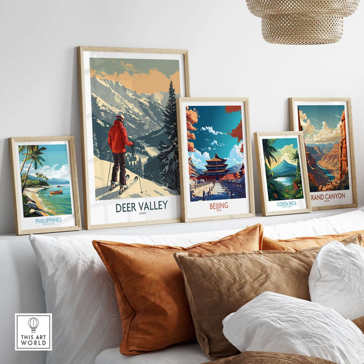 Stylish display of framed ski posters including Deer Valley, Utah, on a modern shelf for travel and nature enthusiasts.