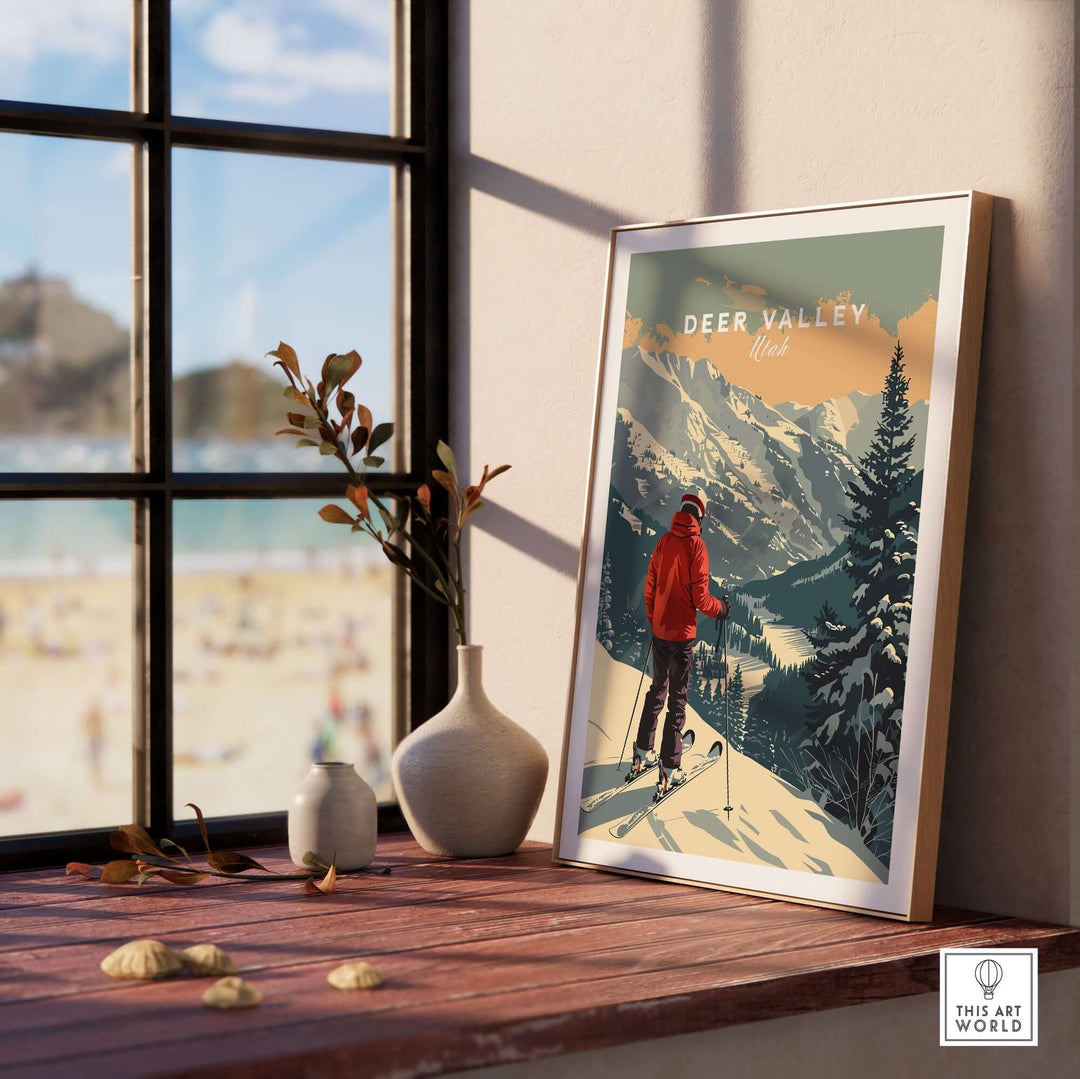 Deer Valley Utah ski poster on a windowsill with mountain and skier scene, framed and set in a sunny interior space.