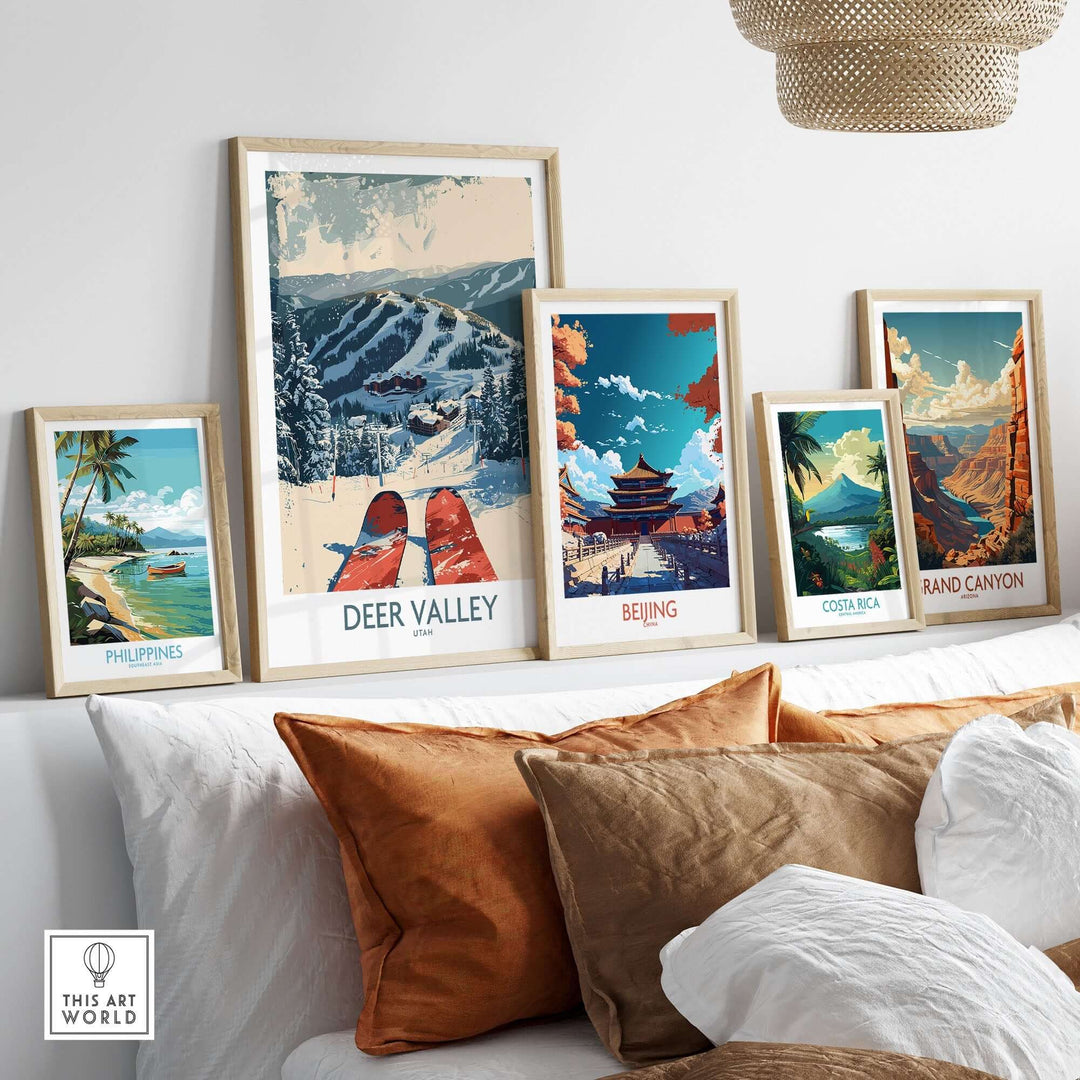 Collection of framed travel posters featuring Deer Valley ski poster, alongside art from Philippines, Beijing, Costa Rica, Grand Canyon.