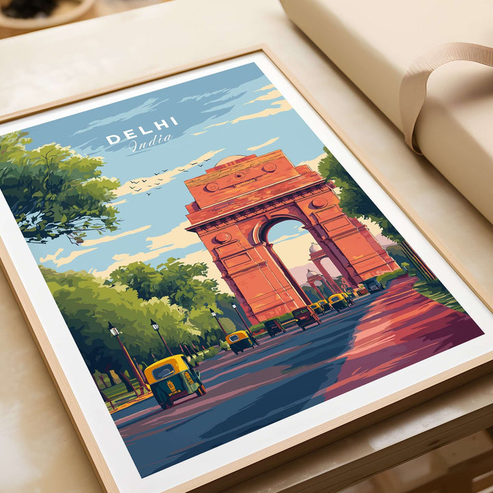 Vibrant travel poster of India Gate in Delhi, showcasing Rajpath, autos, and lush greenery under a blue sky.