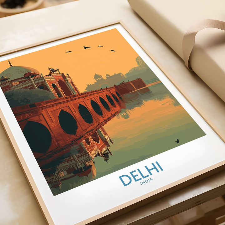 Delhi sunset travel poster featuring Humayun's Tomb and arched bridge reflecting in calm waters.